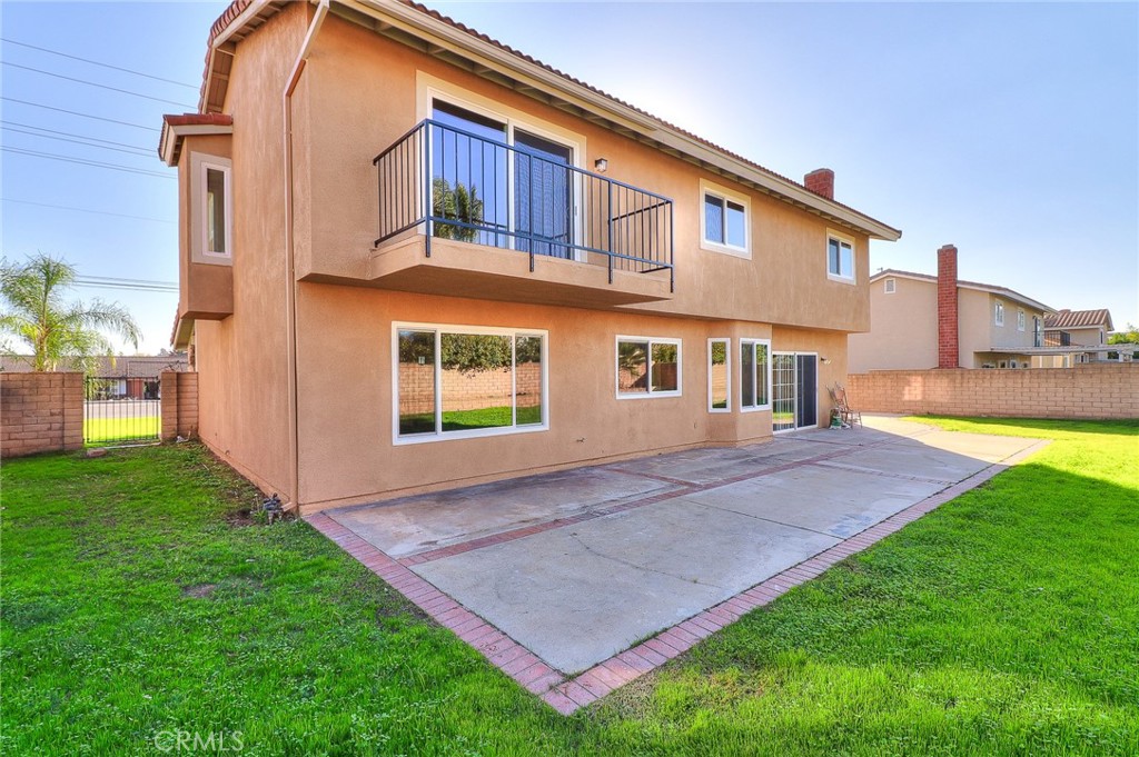 2167 Baseline Road La Verne, CA 91750 - Photo 6 of 7 a view of an house with backyard and a tree