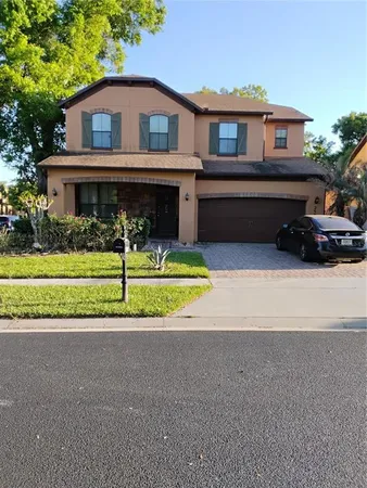 a house view with a garden space