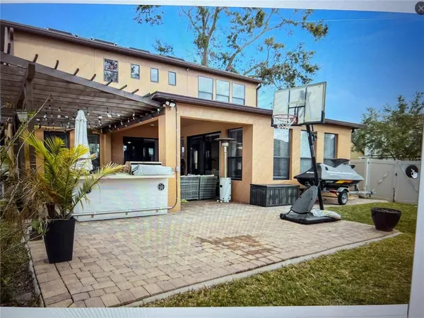 a view of a building with sitting area