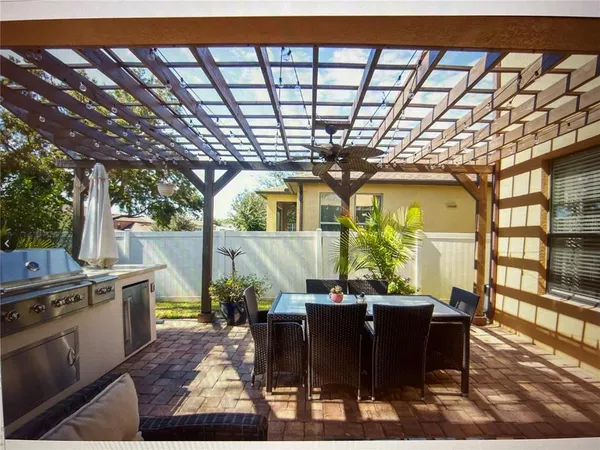 a view of a dining room with furniture window and outside view