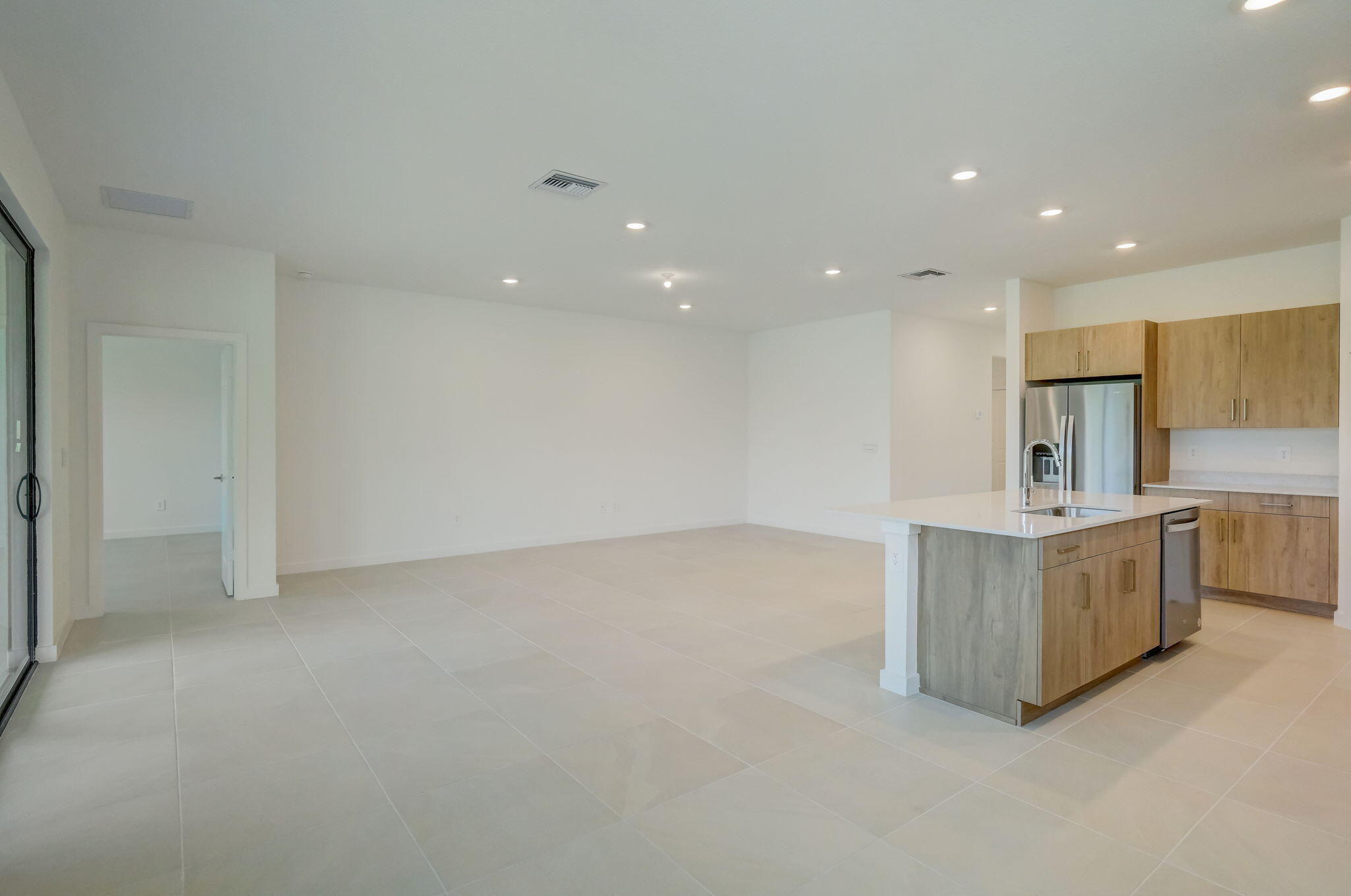 5946 Southeast Sky Blue Circle Stuart, FL 34997 - Photo 13 of 26 living room/kitchen