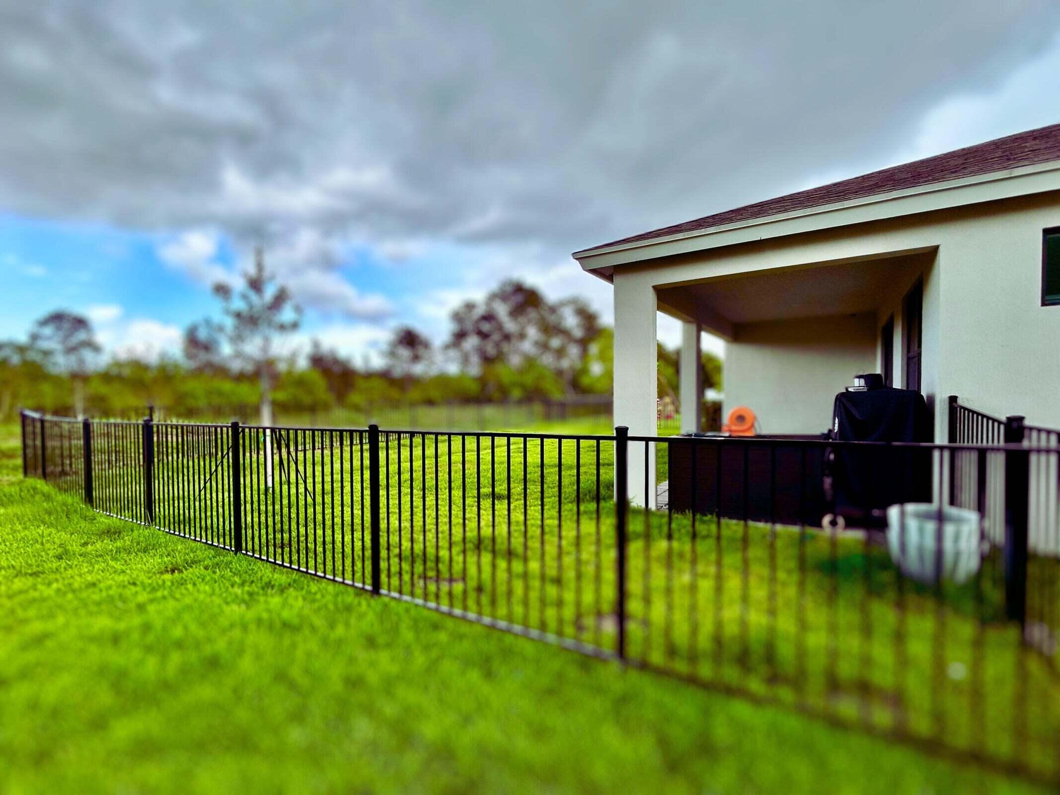 5946 Southeast Sky Blue Circle Stuart, FL 34997 - Photo 23 of 26 Fenced backyard 1