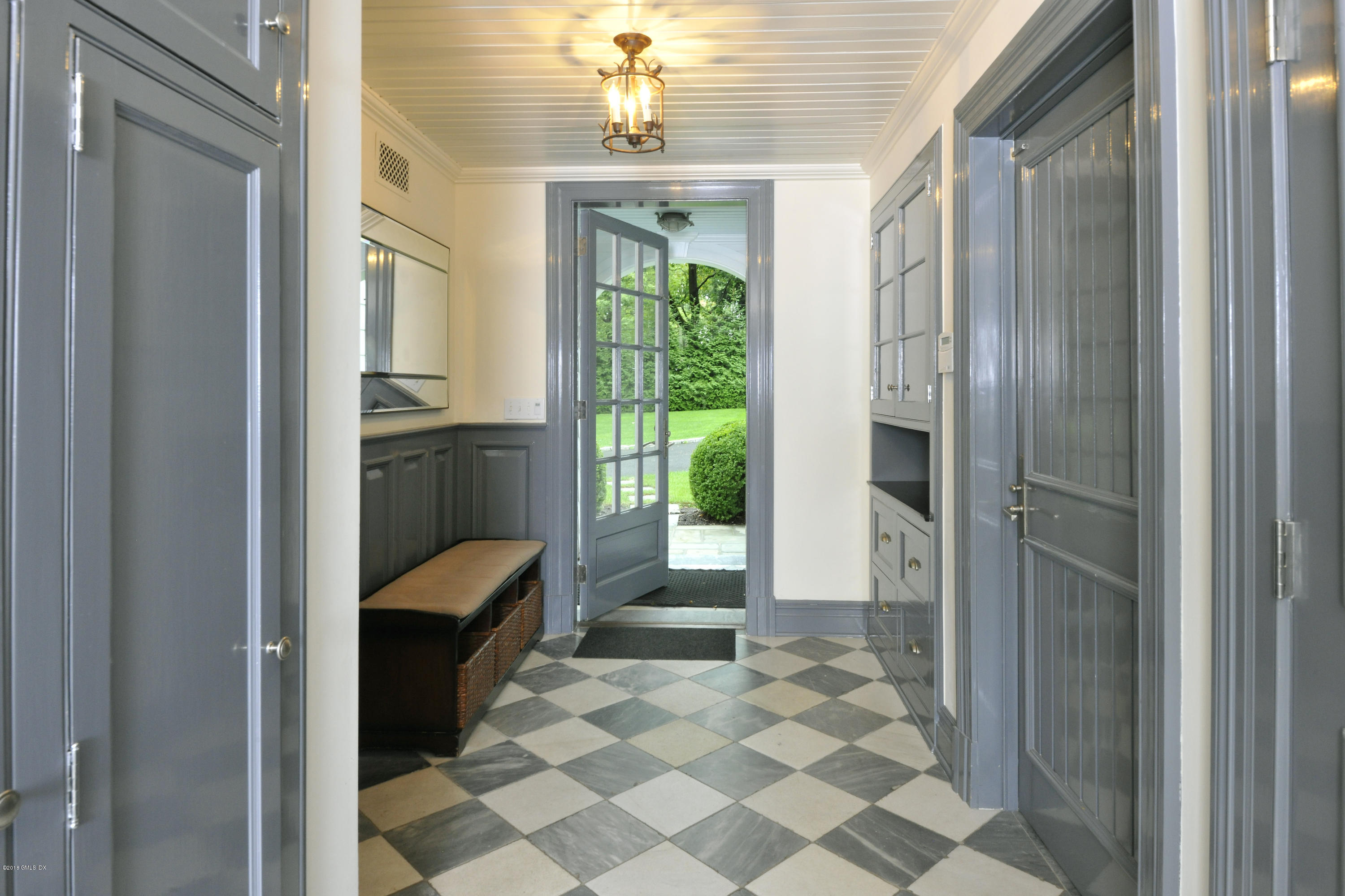 9 Woodside Road Greenwich, CT 06830 - Photo 11 of 20 a view of front door with yard