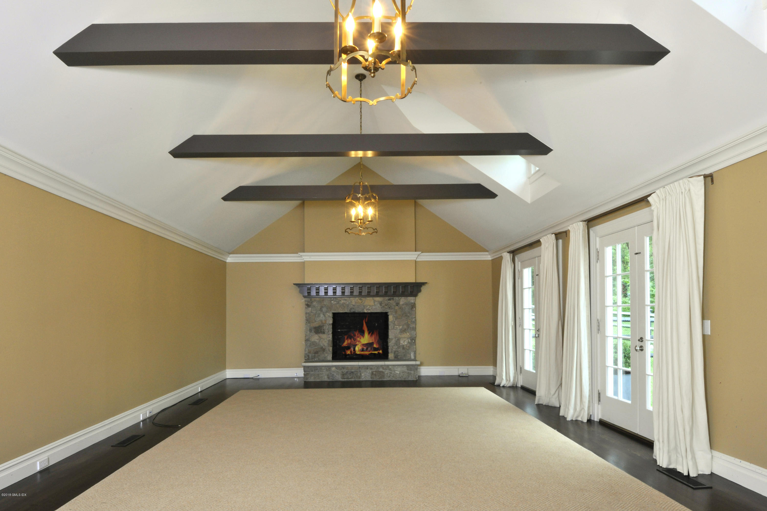 9 Woodside Road Greenwich, CT 06830 - Photo 12 of 20 a view of an empty room with a window