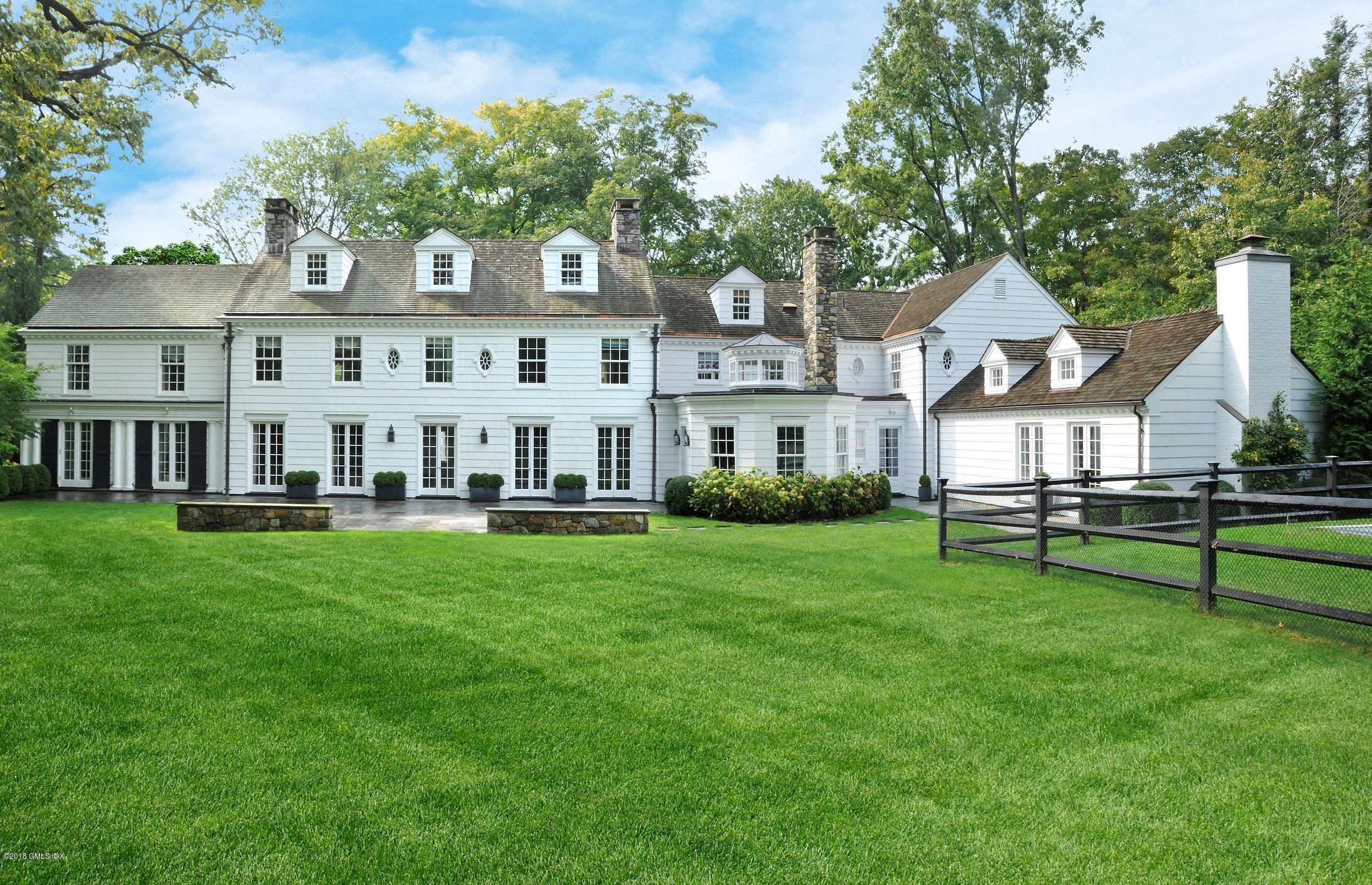 9 Woodside Road Greenwich, CT 06830 - Photo 17 of 20 a view of a house with backyard and porch