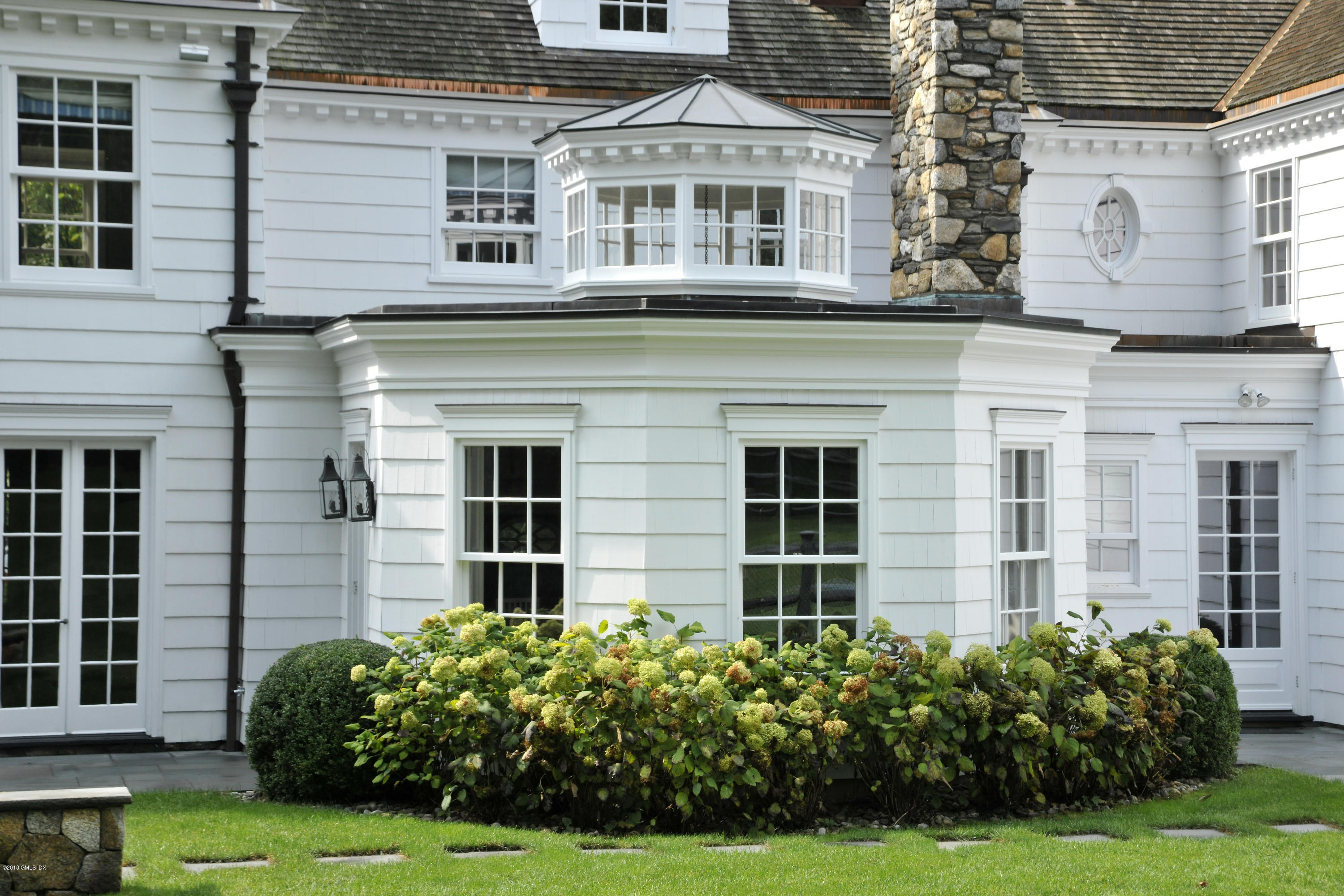 9 Woodside Road Greenwich, CT 06830 - Photo 18 of 20 front view of a building