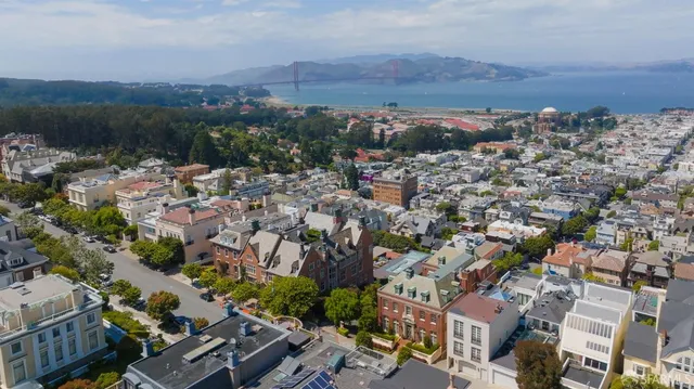 an aerial view of multi story residential apartment building