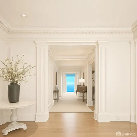 a dining room with furniture a chandelier and wooden floor