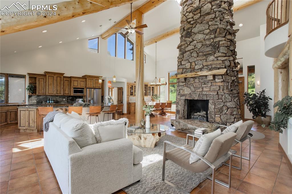 8585 Snowslide Trail Rye, CO 81069 - Photo 11 of 41 Wood burning fireplace with juniper mantle