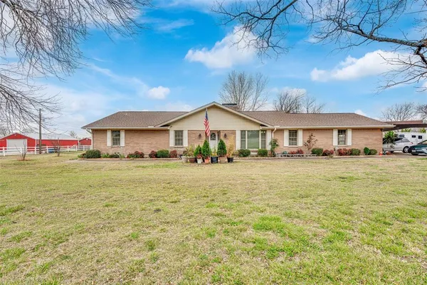 a front view of house with yard