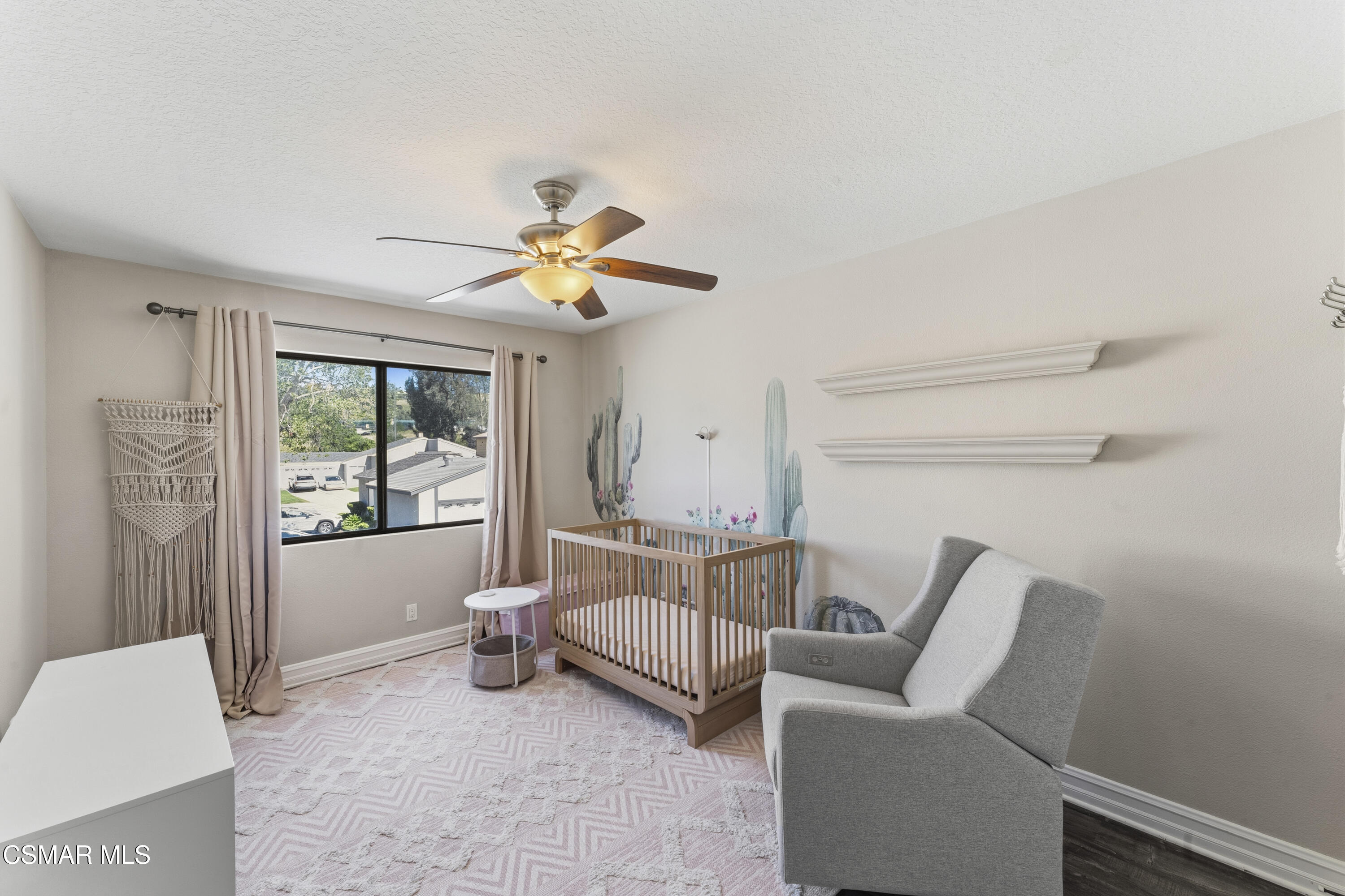 5775 Cochran Street Simi Valley, CA 93063 - Photo 13 of 33 a bedroom with furniture and a window