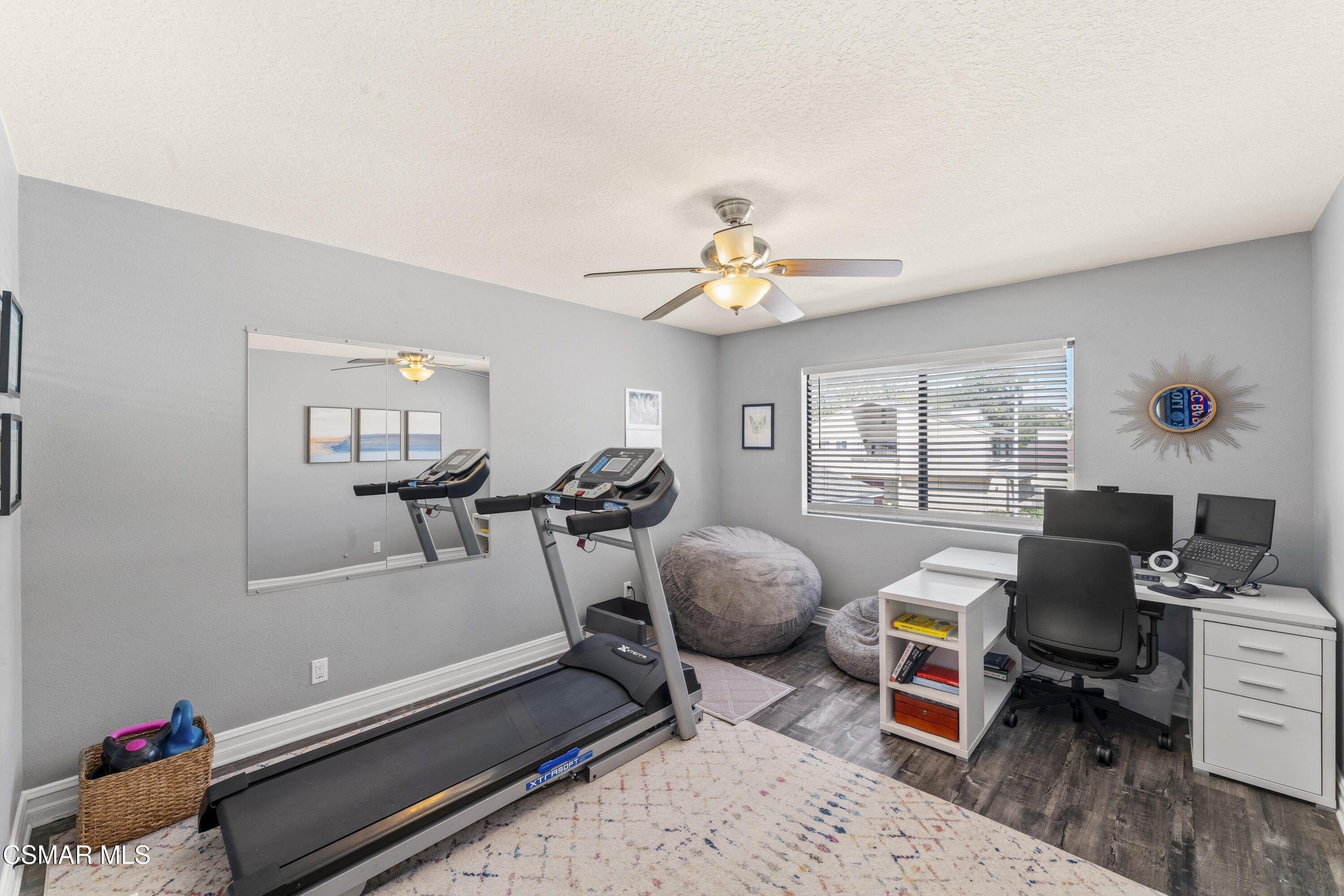 5775 Cochran Street Simi Valley, CA 93063 - Photo 16 of 33 a view of a workspace with furniture and a window