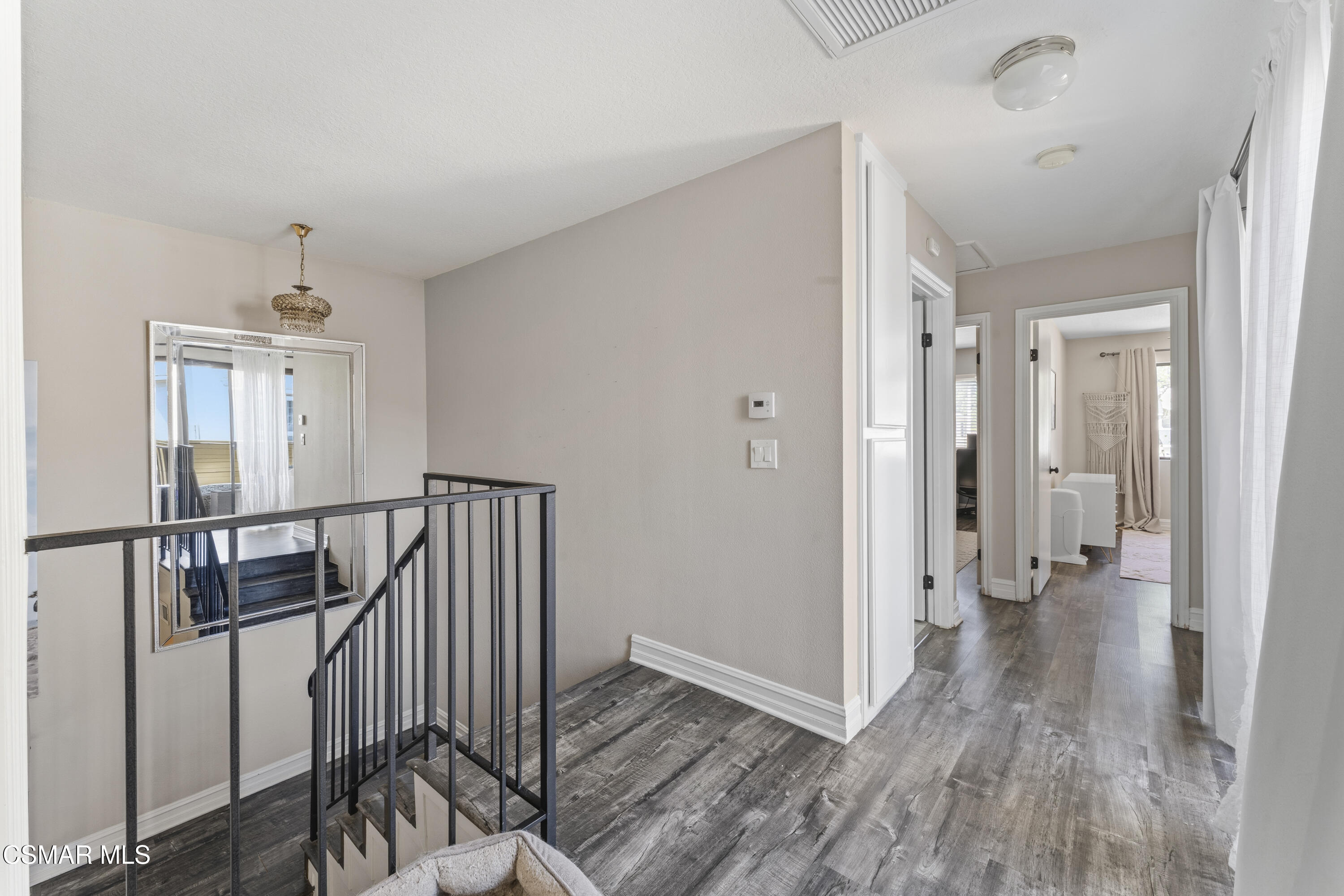 5775 Cochran Street Simi Valley, CA 93063 - Photo 19 of 33 a view of hallway with wooden floor