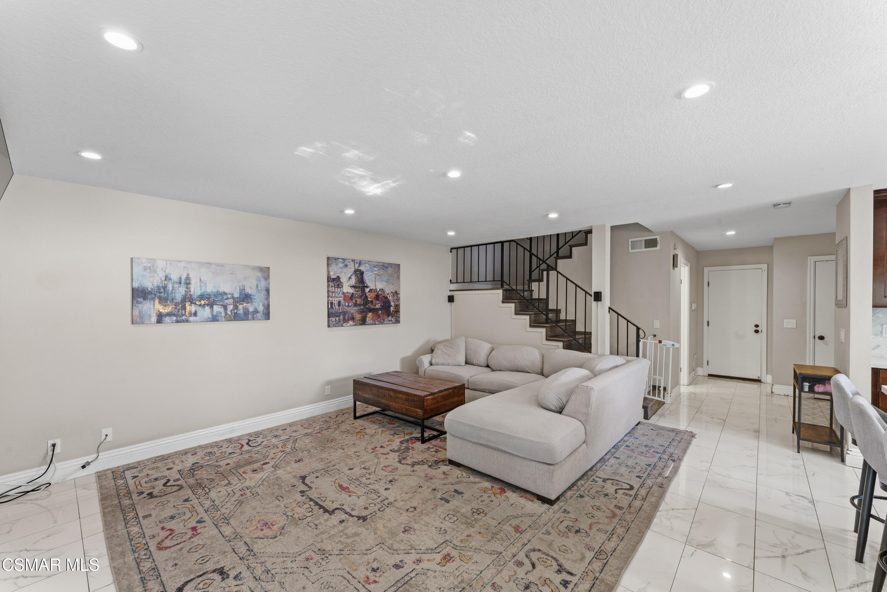 5775 Cochran Street Simi Valley, CA 93063 - Photo 7 of 33 a living room with furniture and wooden floor