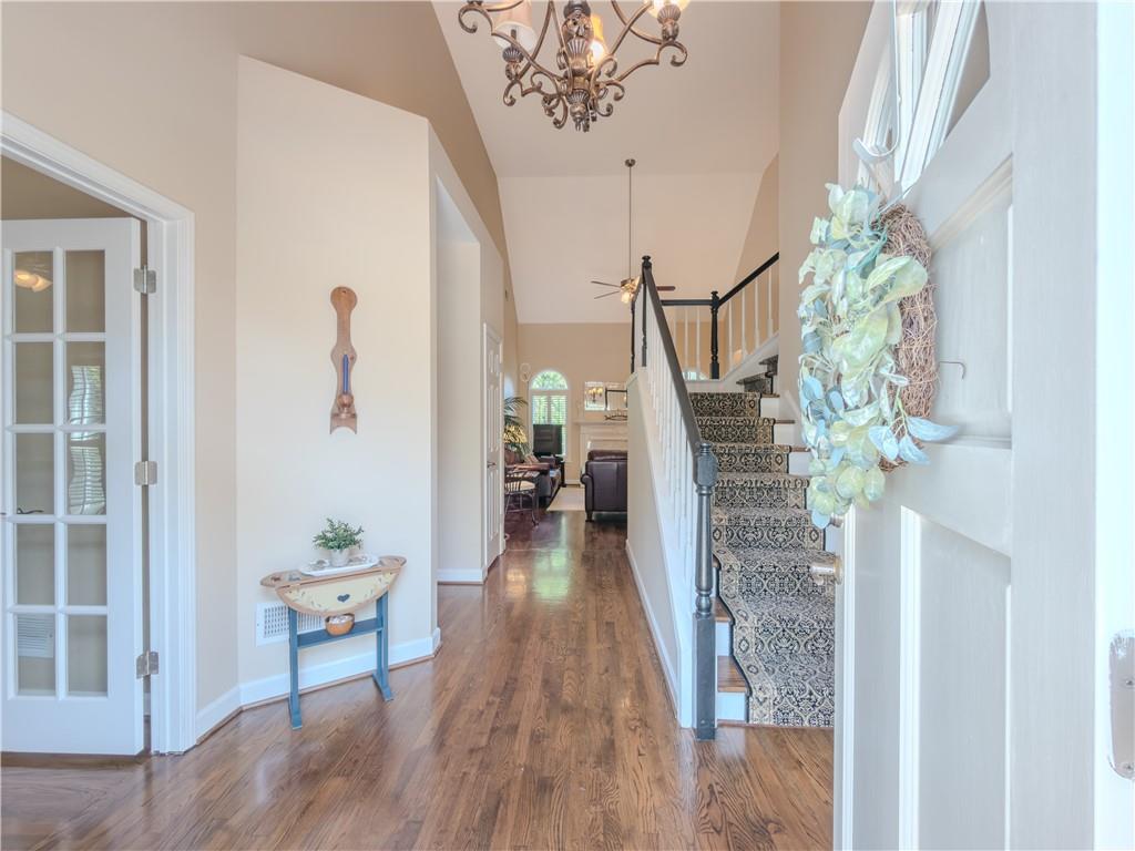 4284 Cedar Bluff Way Southwest Lilburn, GA 30047 - Photo 6 of 62 a living room with furniture and a wooden floor