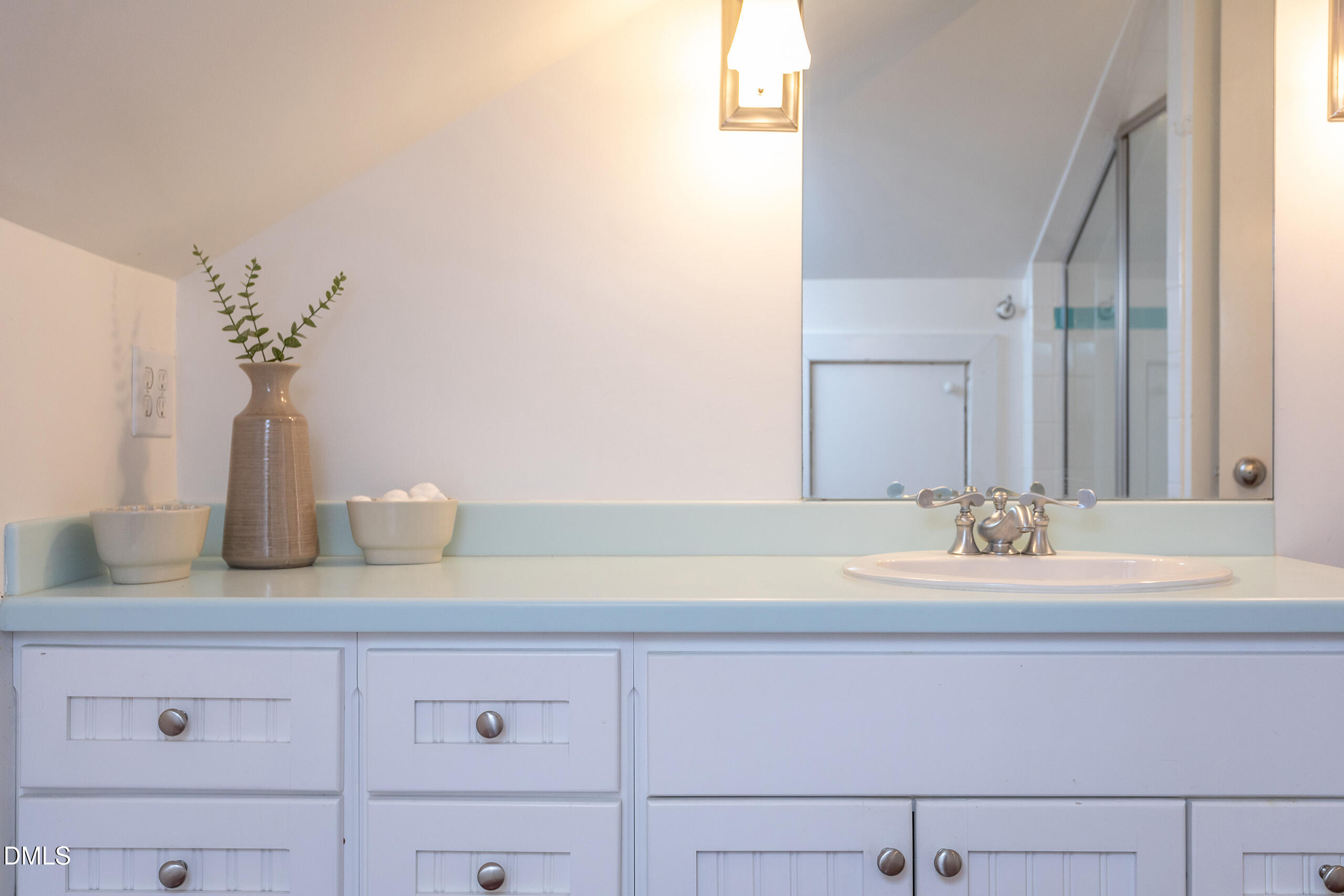 127 Forest Road Raleigh, NC 27605 - Photo 68 of 75 a bathroom with a sink and a mirror