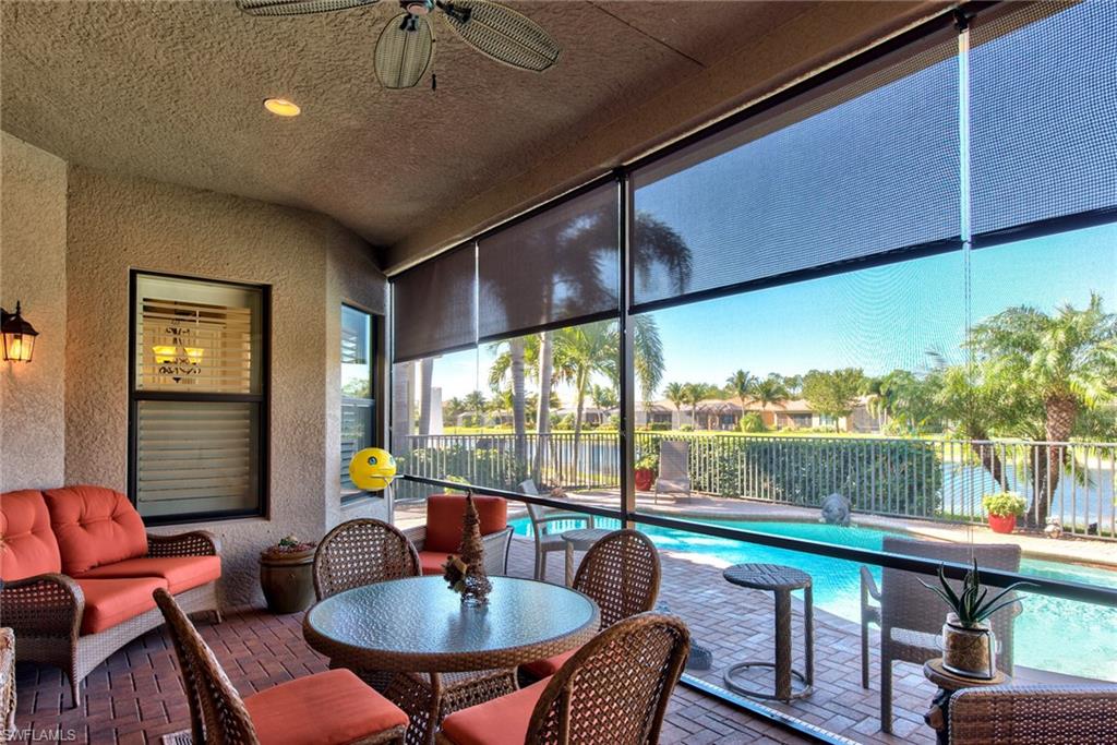 3424 Atlantic Circle Naples, FL 34119 - Photo 6 of 14 a outdoor living space with furniture and garden view