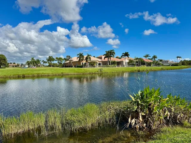 a view of a lake with a big yard