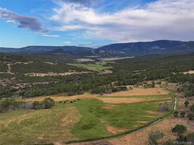 a view of a lake with a mountain