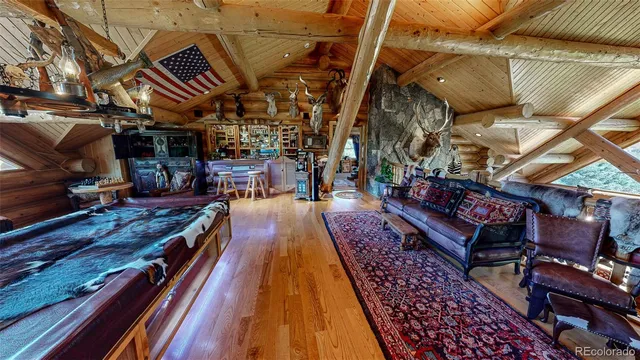 a view of an chairs and table in a patio