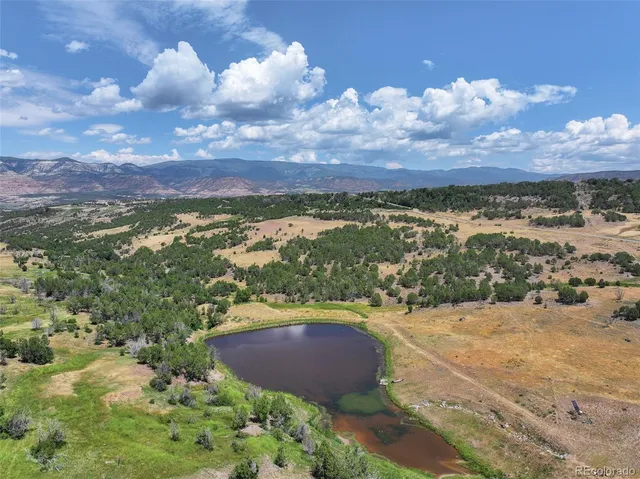 a view of lake and mountain