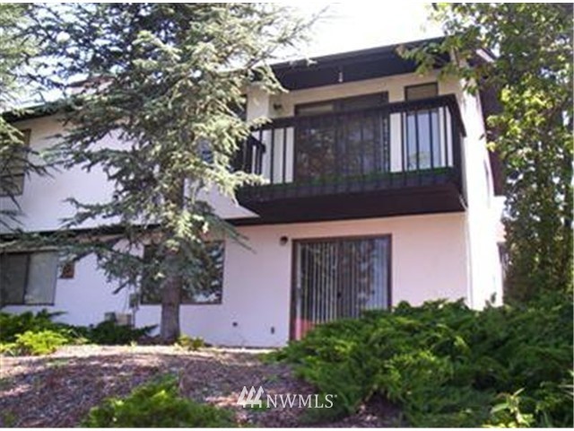 707 Sheridan Road, Unit A&B Bremerton, WA 98310 - Photo 1 of 12 front view of a house with a tree