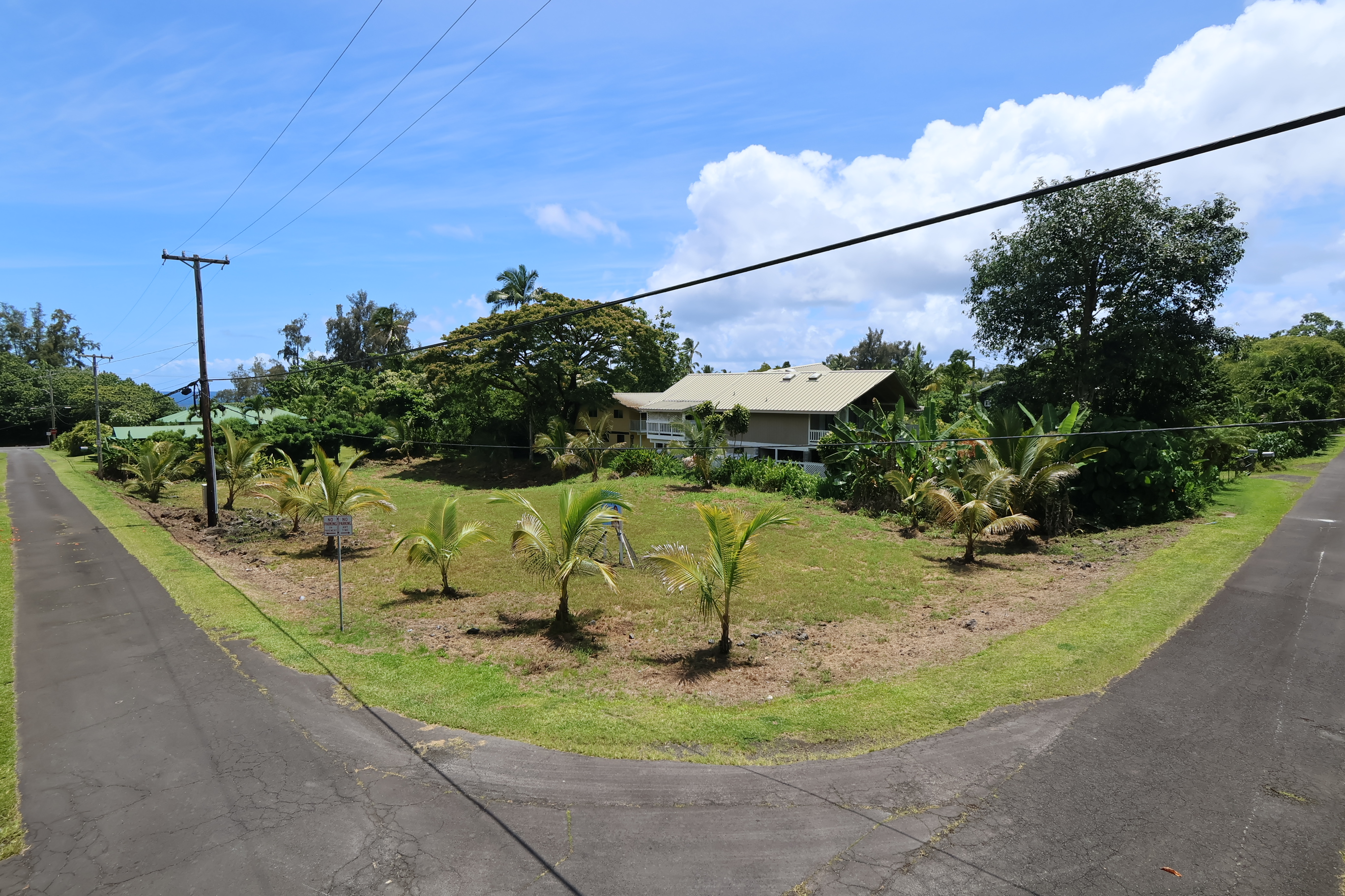 106 B Nene Street Hilo, HI 96720 - Photo 14 of 14 a view of a swimming pool with a yard