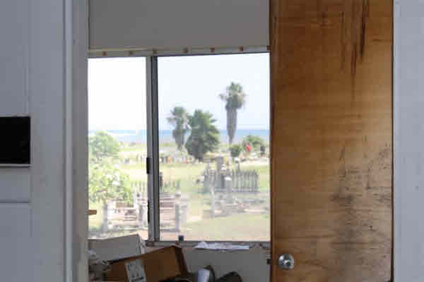 8399 Elepaio Road Kekaha, HI 96752 - Photo 1 of 8 a view of a bathroom with a large window and front door