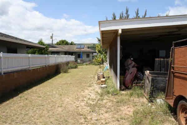 8399 Elepaio Road Kekaha, HI 96752 - Photo 8 of 8 a view of a balcony with two chairs