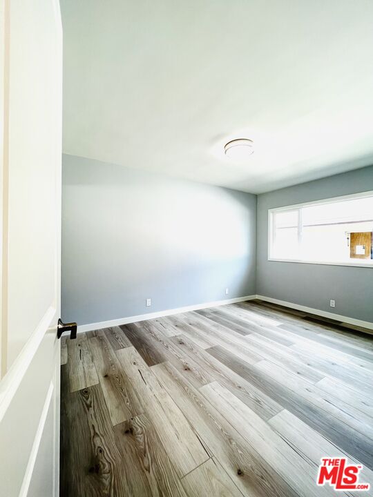 1116 San Rafael Avenue, Unit 1 Glendale, CA 91202 - Photo 27 of 33 a view of empty room with wooden floor and fan