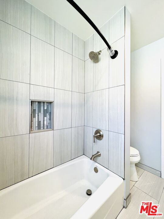 1116 San Rafael Avenue, Unit 1 Glendale, CA 91202 - Photo 30 of 33 a bathroom with a tub and a shower