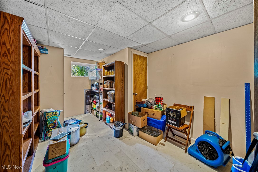 6981 Howard Road Williamsfield, OH 44093 - Photo 26 of 42 Basement featuring a drop ceiling
