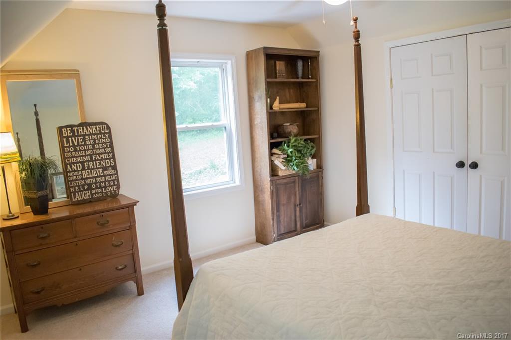 9205 Ladson Road Indian Land, SC 29707 - Photo 12 of 16 a bedroom with a bed and a window