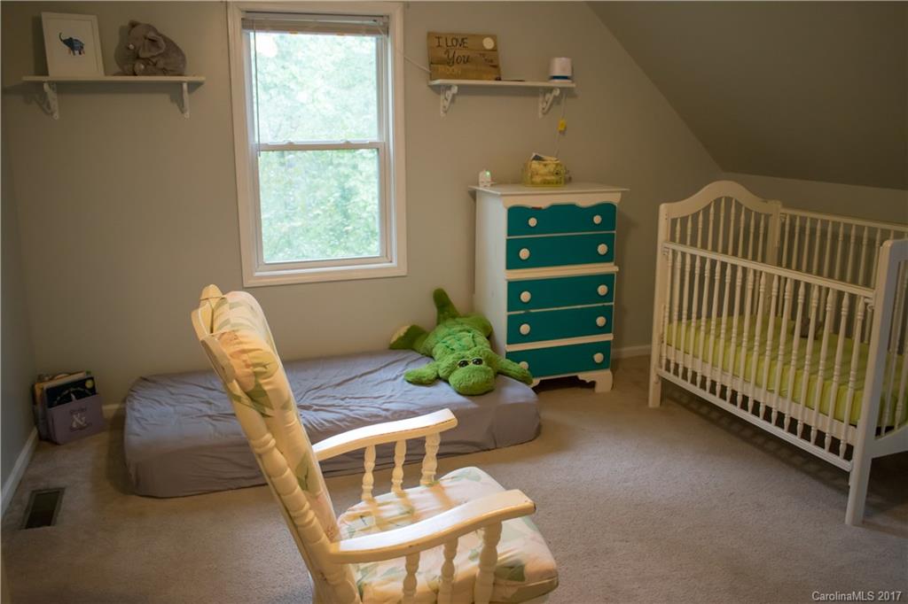 9205 Ladson Road Indian Land, SC 29707 - Photo 16 of 16 a room with a chair and a window