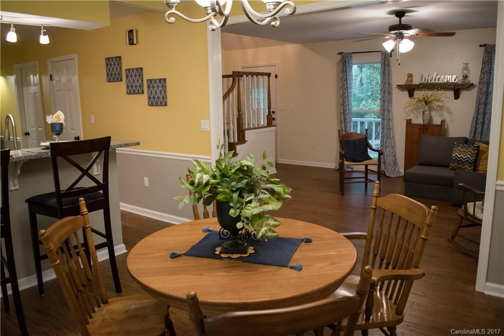 9205 Ladson Road Indian Land, SC 29707 - Photo 4 of 16 a view of a dining room with furniture