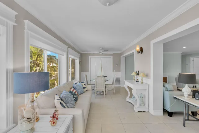 a living room with furniture and a table