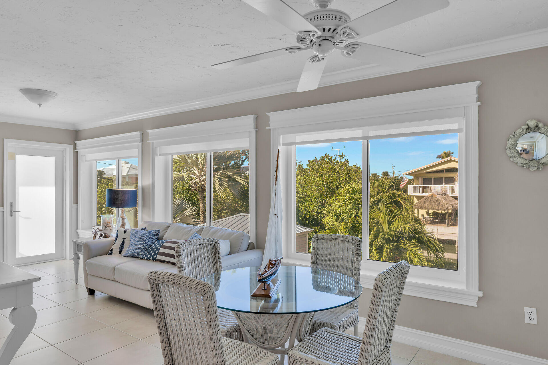 341 Sombrero Beach Road Marathon, FL 33050 - Photo 22 of 44 a living room with furniture a large window and a table
