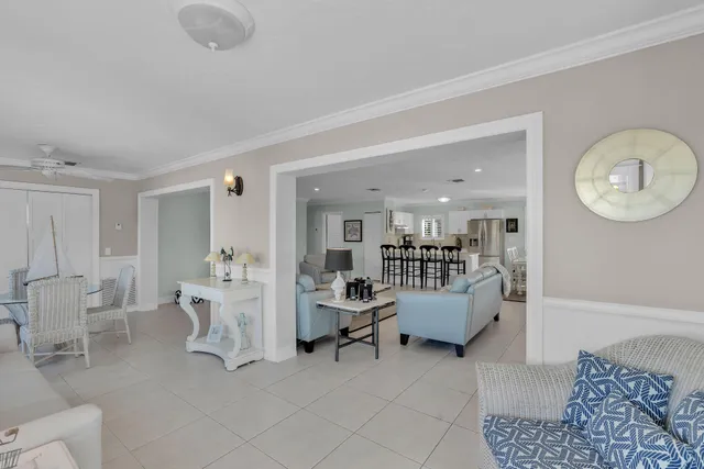 a living room with fireplace furniture and a flat screen tv