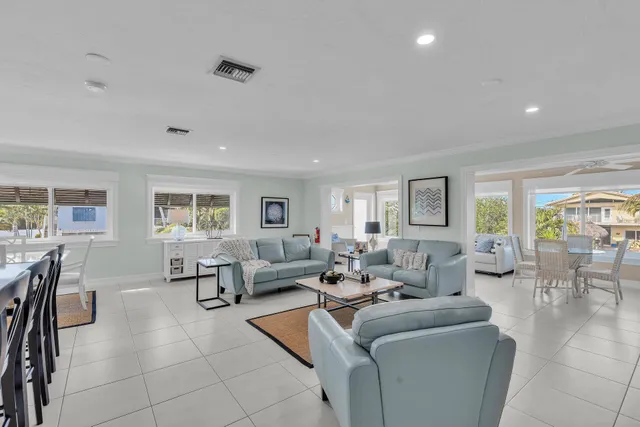 a kitchen with stainless steel appliances a refrigerator sink and cabinets