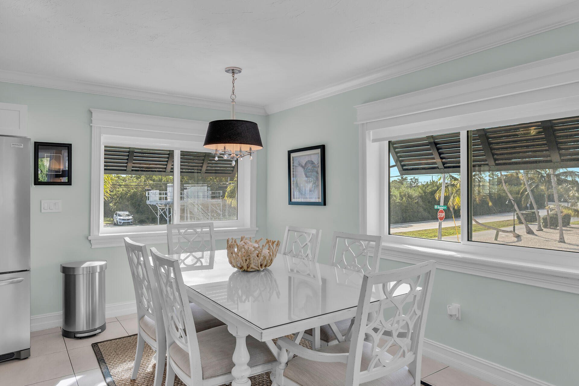 341 Sombrero Beach Road Marathon, FL 33050 - Photo 32 of 44 a dining room with furniture window wooden floor