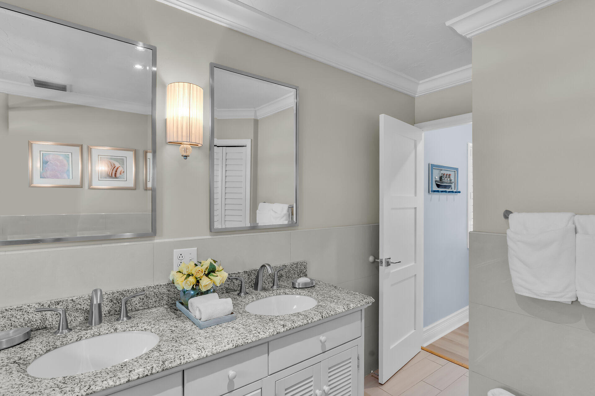 341 Sombrero Beach Road Marathon, FL 33050 - Photo 37 of 44 a bathroom with a granite countertop sink and a mirror