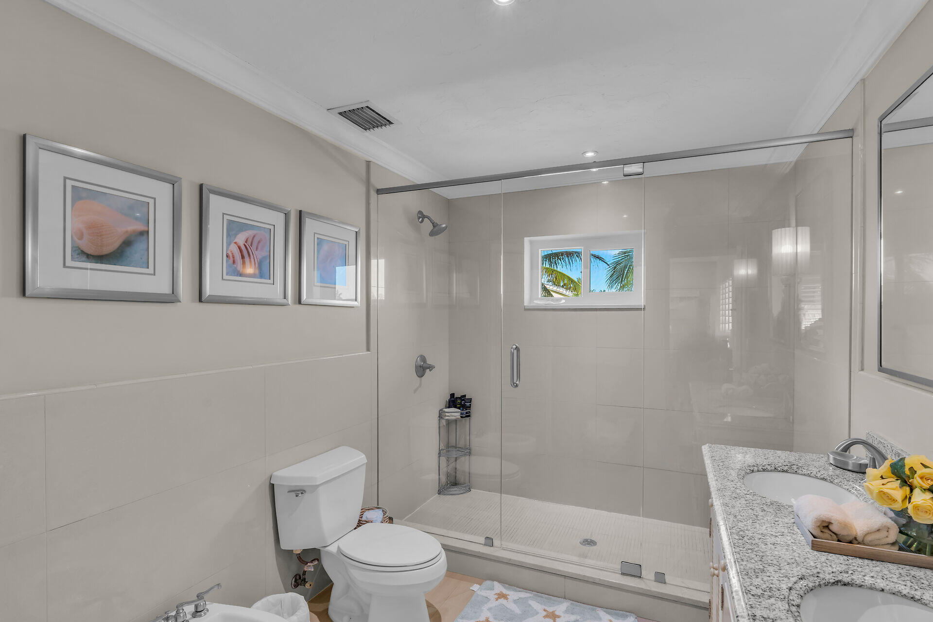 341 Sombrero Beach Road Marathon, FL 33050 - Photo 38 of 44 a bathroom with a shower a toilet and a shower