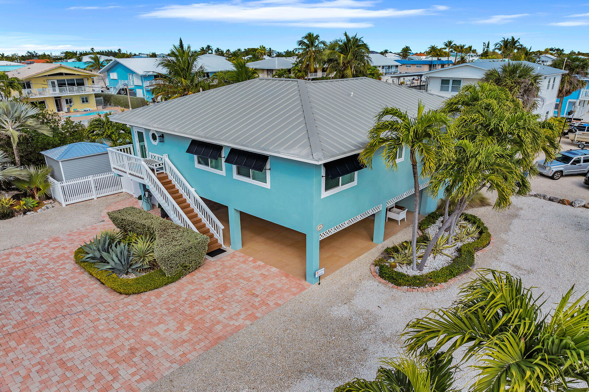 341 Sombrero Beach Road Marathon, FL 33050 - Photo 5 of 44 an aerial view of a house with garden space and street view
