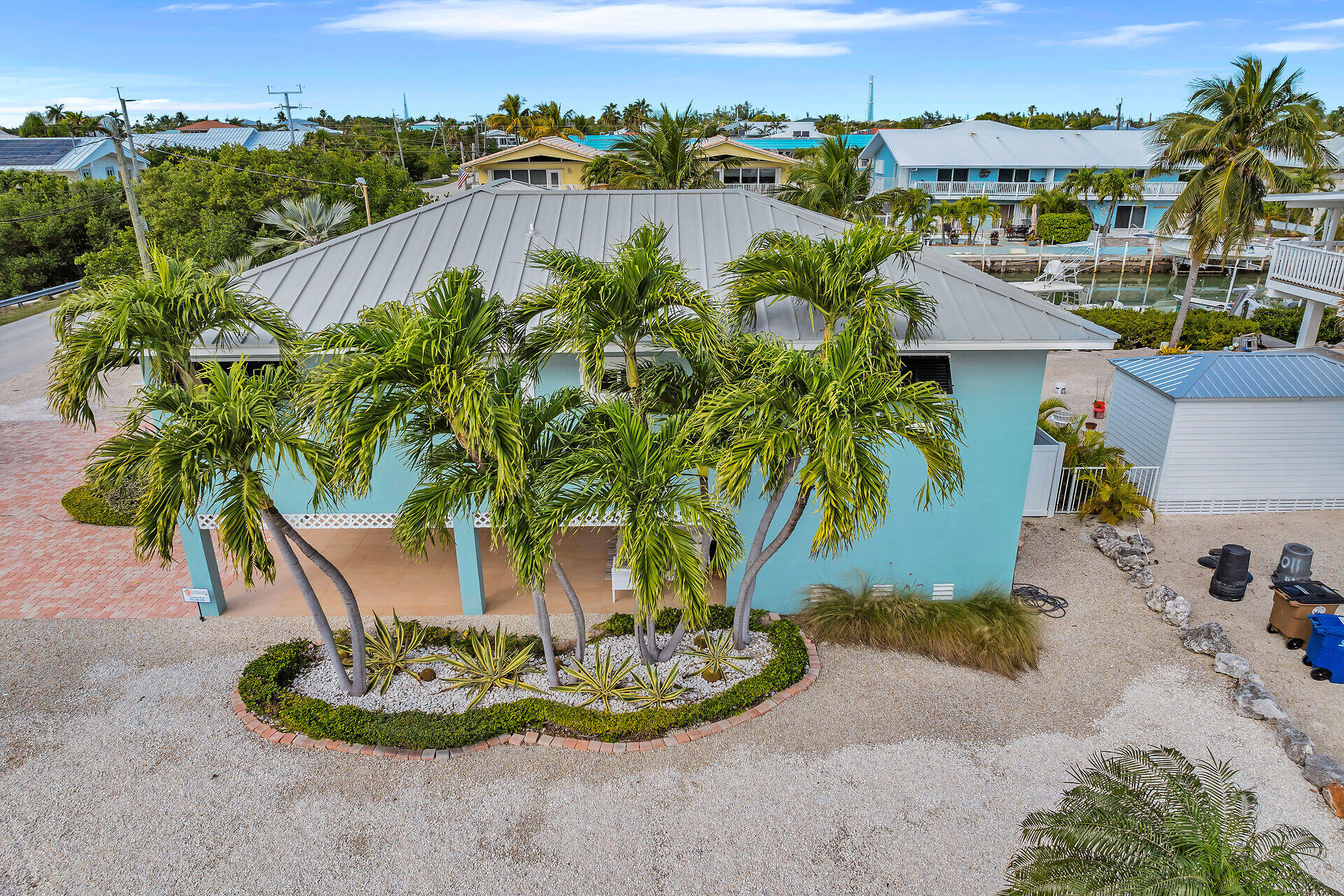 341 Sombrero Beach Road Marathon, FL 33050 - Photo 6 of 44 a view of a swimming pool with a lake view