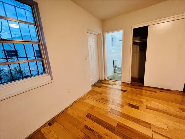 a view of empty room with front door