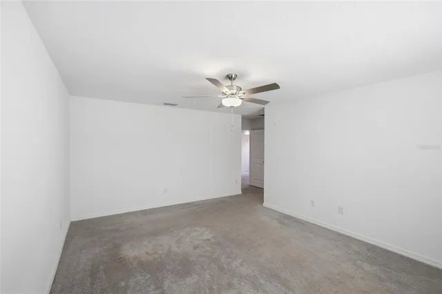 a view of a ceiling fan in a room