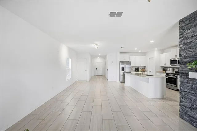a view of kitchen with wooden floor