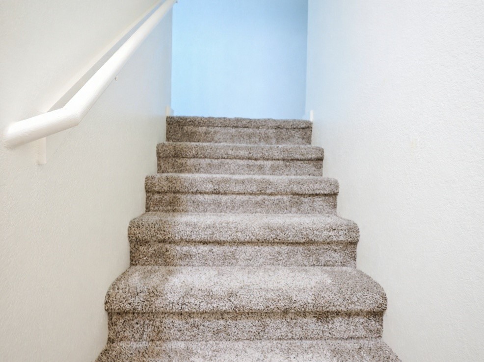 21155 Gosling Road, Unit 7D Spring, TX 77388 - Photo 14 of 24 a view of staircase with white walls
