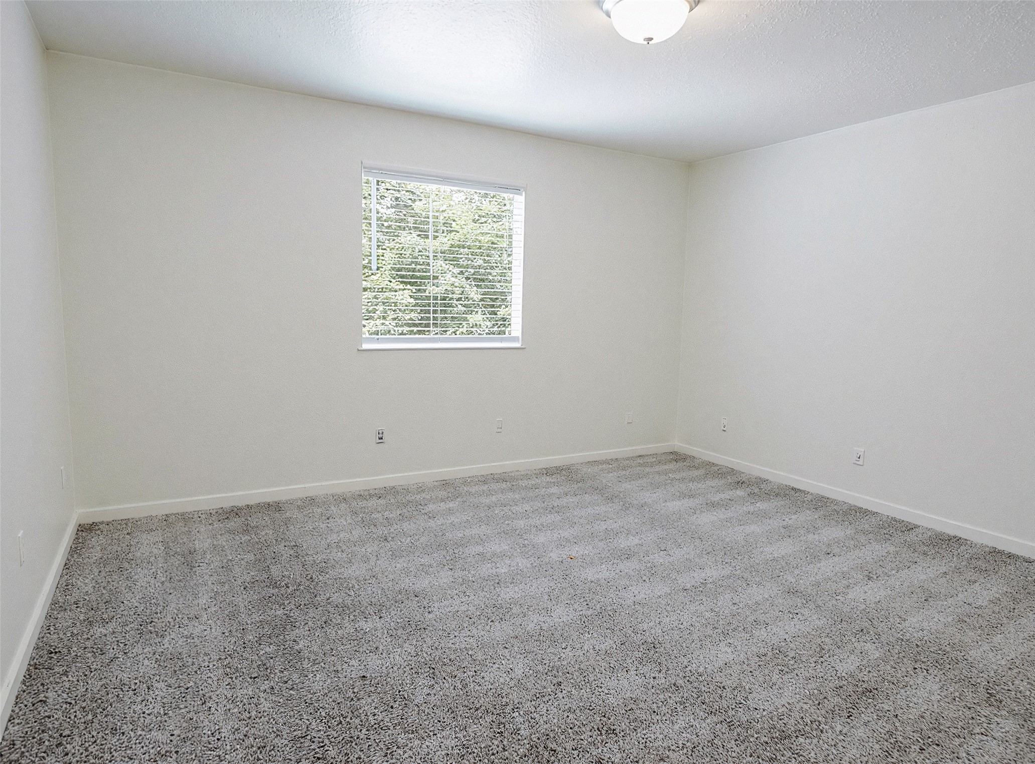 21155 Gosling Road, Unit 7D Spring, TX 77388 - Photo 19 of 24 an empty room with a window