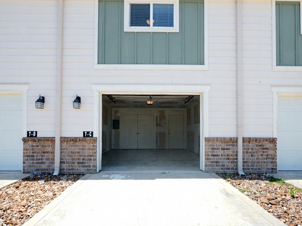 21155 Gosling Road, Unit 7D Spring, TX 77388 - Photo 2 of 24 a view of an empty room with a fireplace